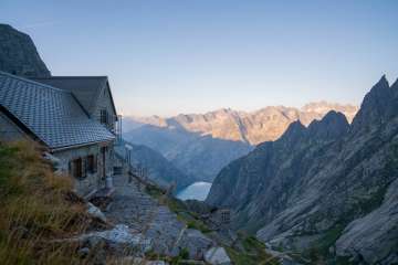 The Gelmerhütte is nestled in the rocks high above Lake Gelmer. The view of Lake Gelmer and the surrounding mountains is breathtaking.