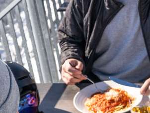 Two people eating